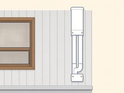 紺色作業着の技術者が化粧カバーを施工するイラスト